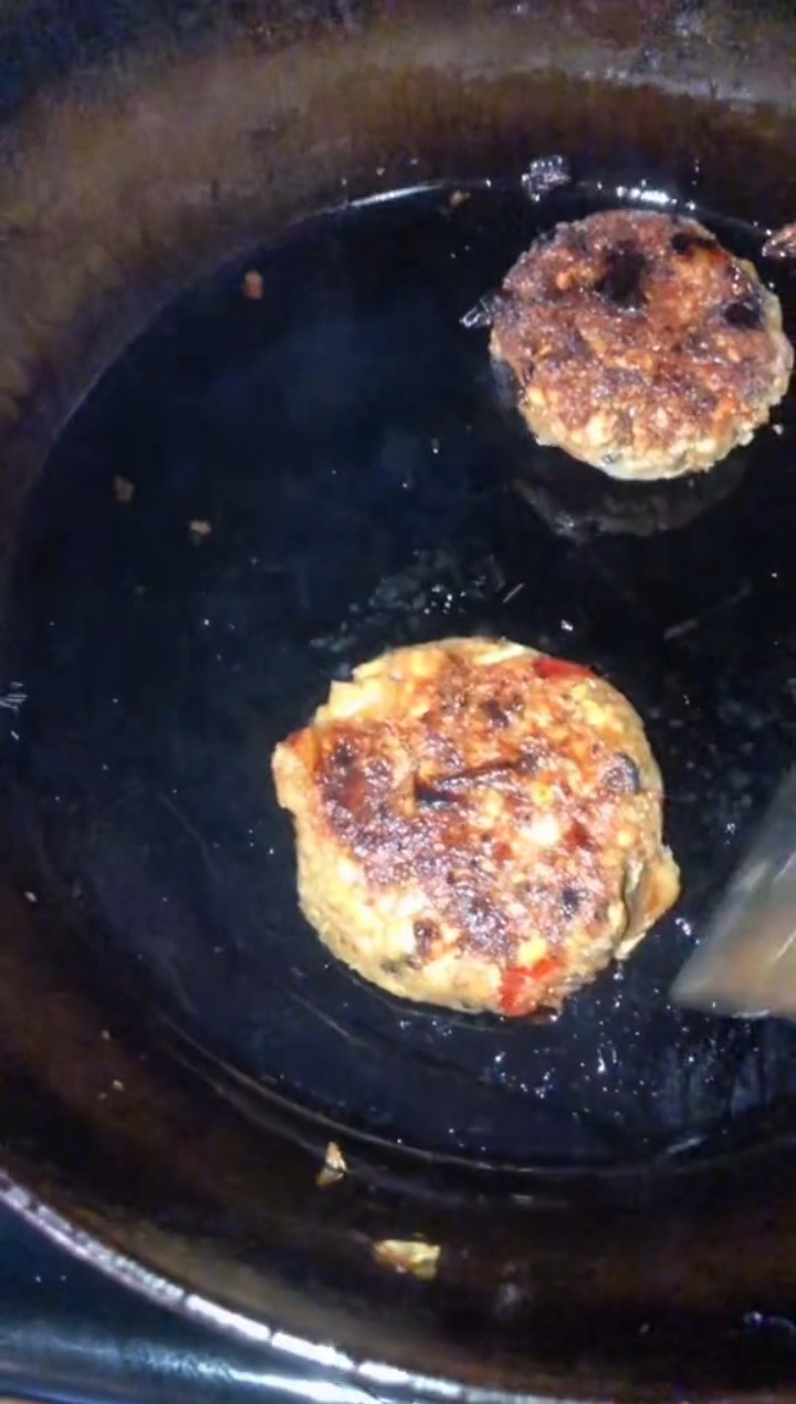 This photo shows Aiyaken Sarai preparing alkaline vegan burgers which are an excellent alkaline meat substitute.